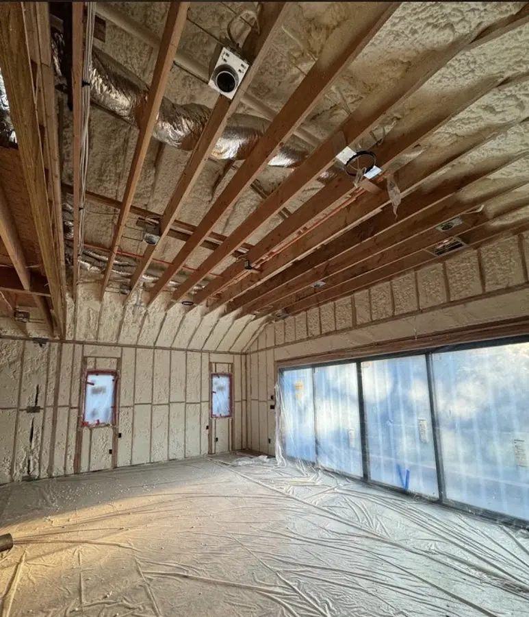 Interior walls and ceiling insulated with spray foam during new construction in Riverton